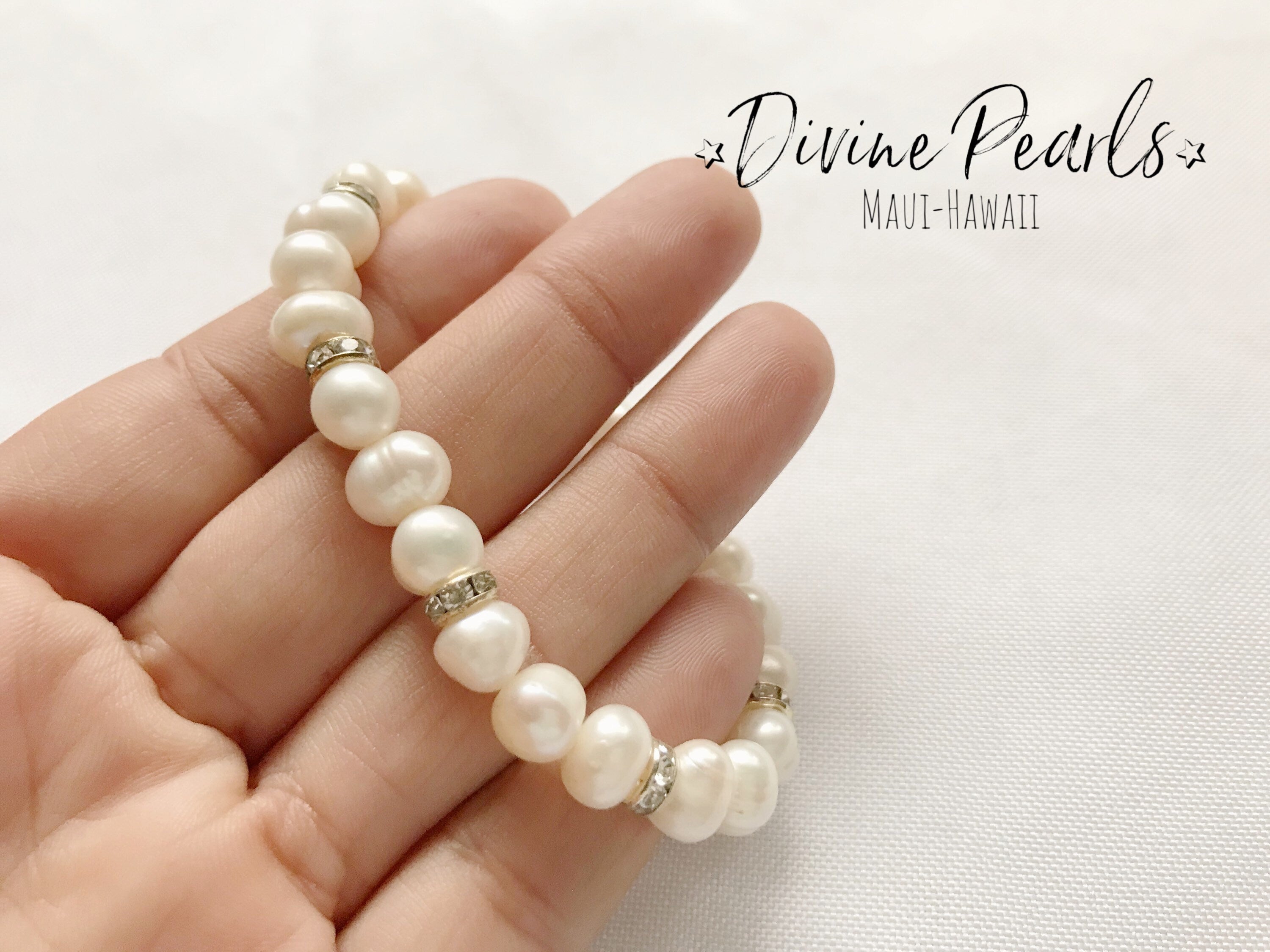 White freshwater pearls & zirconia crystals
